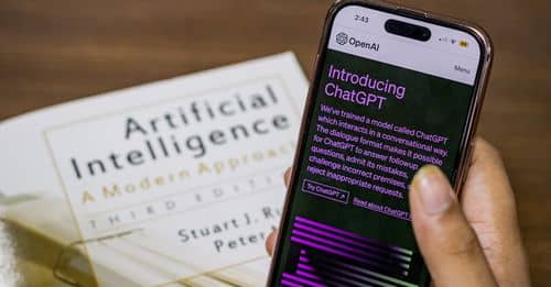 Webpage of ChatGPT, a prototype AI chatbot, is seen on the website of OpenAI, on iPhone or smartphone