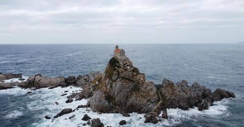 A church on a rock in Petrovac, Montenegro