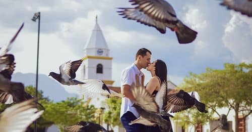 Photo Of Couple Kissing Surrounded By Birds