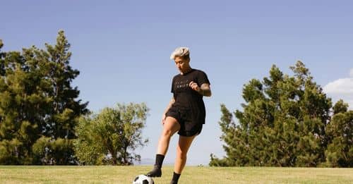 Photo Of Person Playing Soccer On The Field 