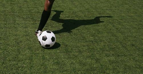 Anonymous soccer player on field during match