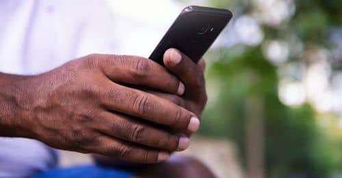 Person Holding Black Android Smartphone