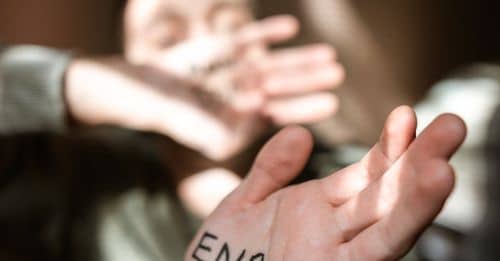 Woman's Palm with Written Message