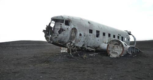 Gray Airplane on Seashore