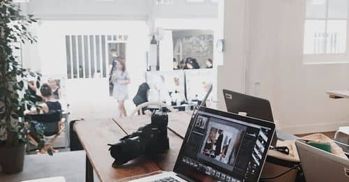 Turned-on Gray Laptop Computer on Table