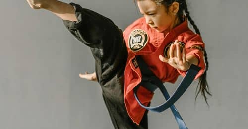 A Kid Practicing His Martial Arts