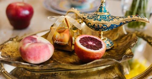 Fruits And Gift On Golden Tray