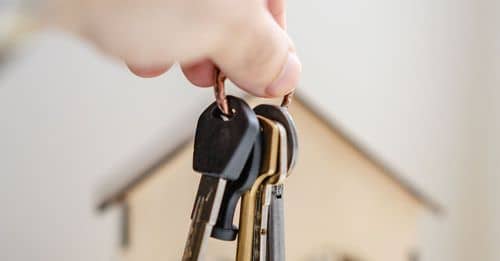 Person with keys for real estate