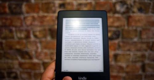 Person Holding Amazon Kindle Ebook