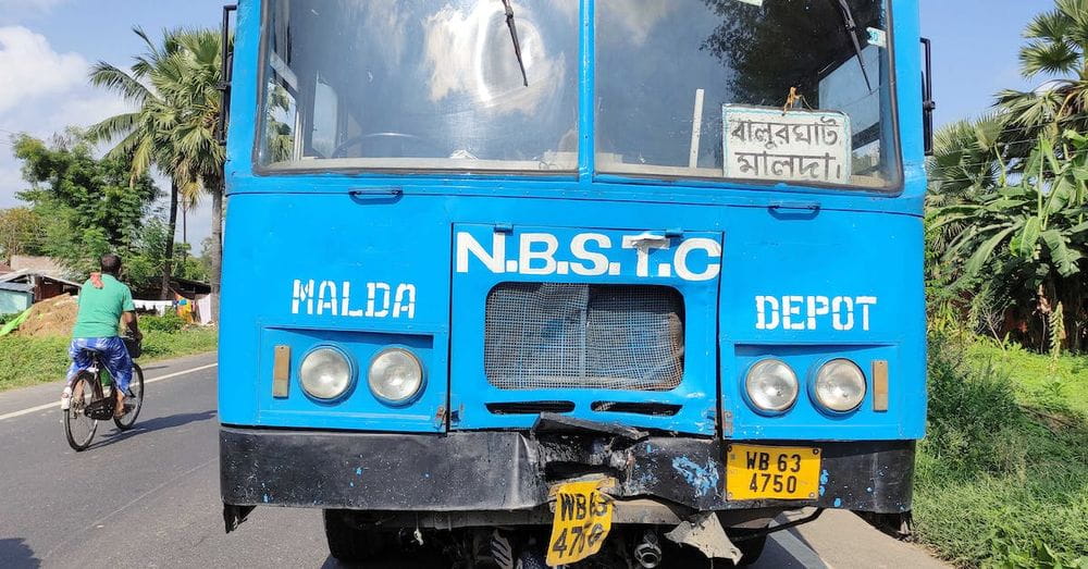 Blue and White Bus on Road