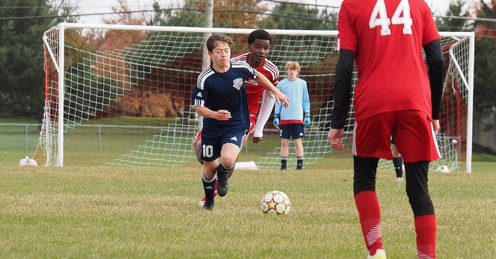 A very competitive youth soccer match.