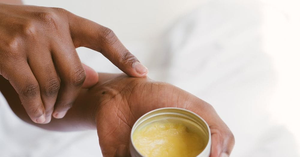 Person Holding A Hand Cream