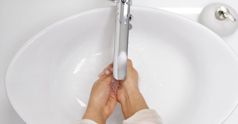 Woman Washing Her Hands With Soap