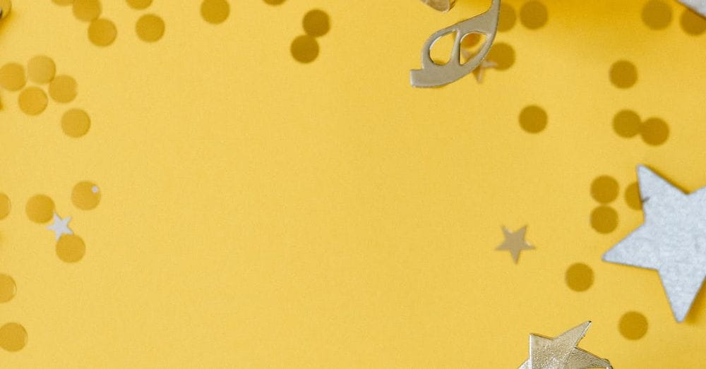 Golden Trophy and Silver Stars on Yellow Background