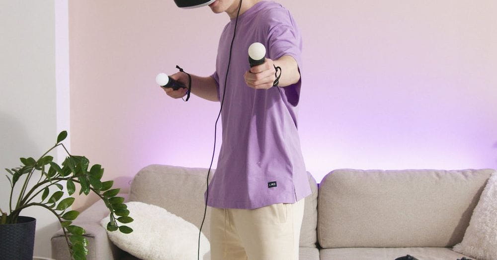 Person in Purple Shirt Playing PlayStation Vr